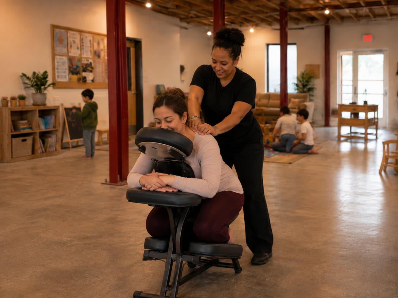Concept rendering: a visiting massage therapist giving a chair massage